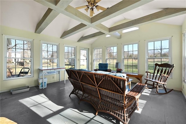 sunroom featuring plenty of natural light and lofted ceiling with beams