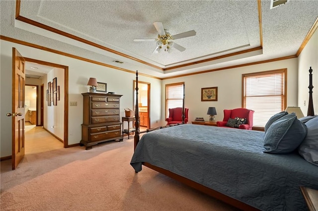 bedroom with a raised ceiling, ceiling fan, and ornamental molding