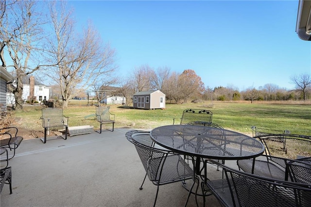 view of patio / terrace featuring a storage shed