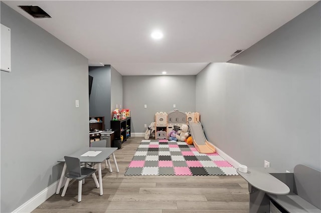 bedroom with light wood-type flooring