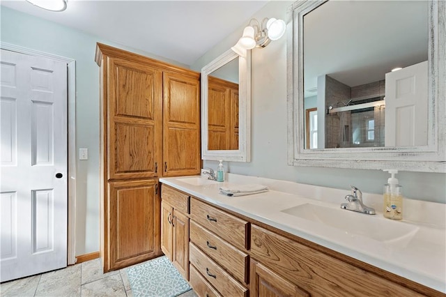 bathroom with vanity and an enclosed shower