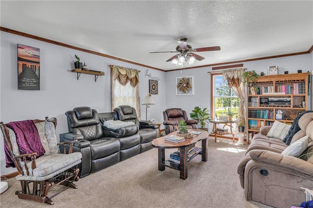 living room featuring ceiling fan, light colored carpet, ornamental molding, and a textured ceiling