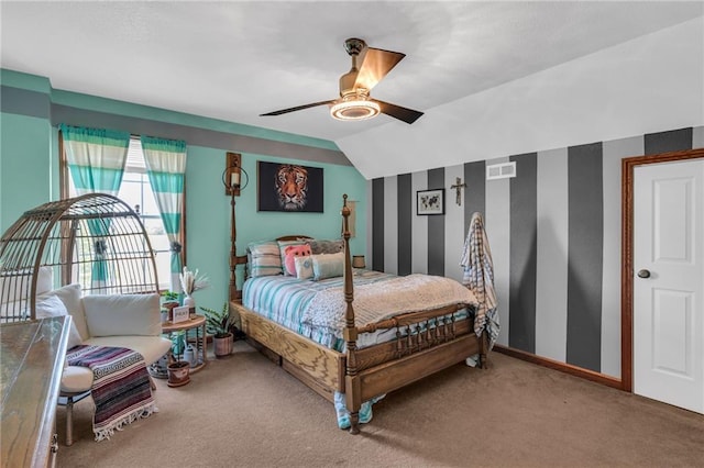 bedroom featuring ceiling fan, carpet floors, and vaulted ceiling