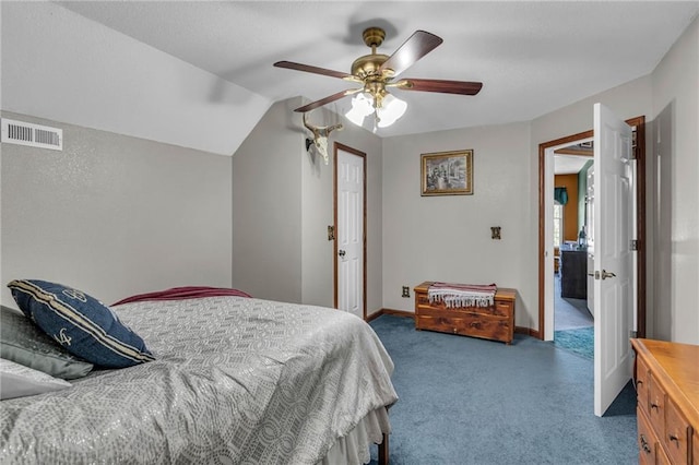 bedroom featuring carpet, ceiling fan, and vaulted ceiling