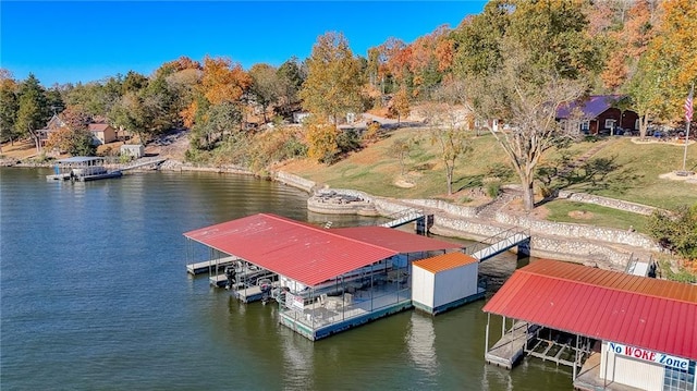 dock area featuring a water view