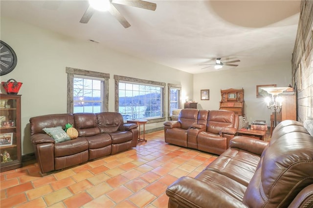 living room featuring ceiling fan and light tile patterned floors