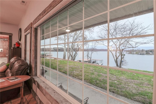 sunroom with a water view