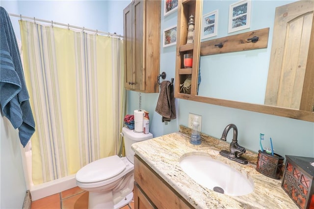 bathroom featuring walk in shower, tile patterned flooring, vanity, and toilet