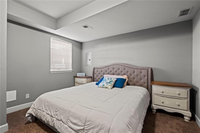 bedroom featuring dark carpet