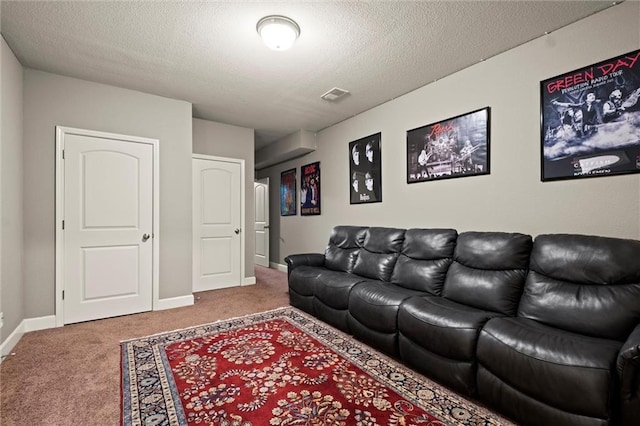 carpeted living room featuring a textured ceiling