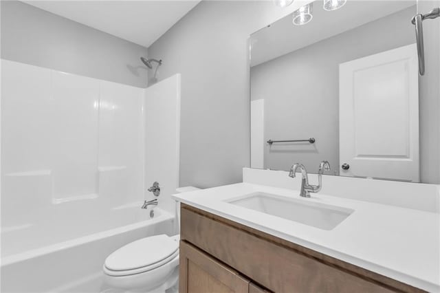 full bath with toilet, vanity, and shower / bathtub combination