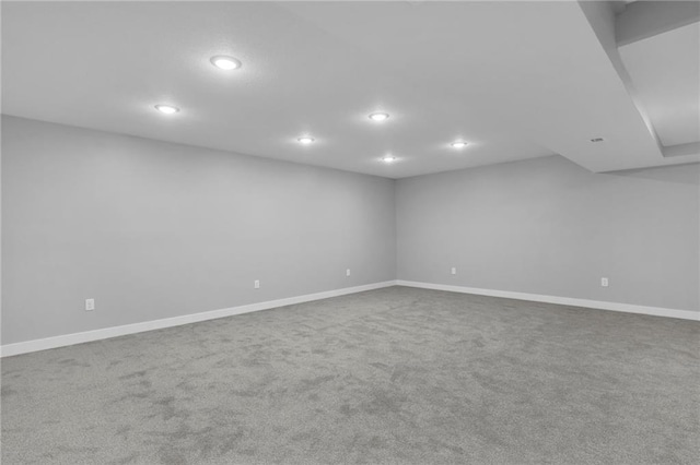 empty room with recessed lighting, carpet, and baseboards