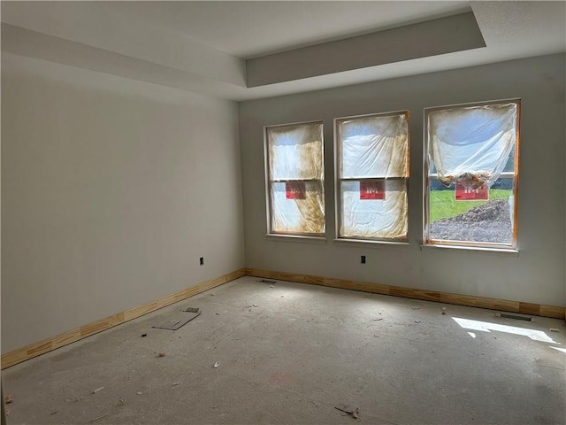17756 Houston St, Gardner, KS 66030 - unfurnished room featuring baseboards and a tray ceiling