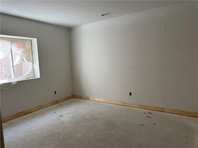 17756 Houston St, Gardner, KS 66030 - spare room with concrete flooring and baseboards