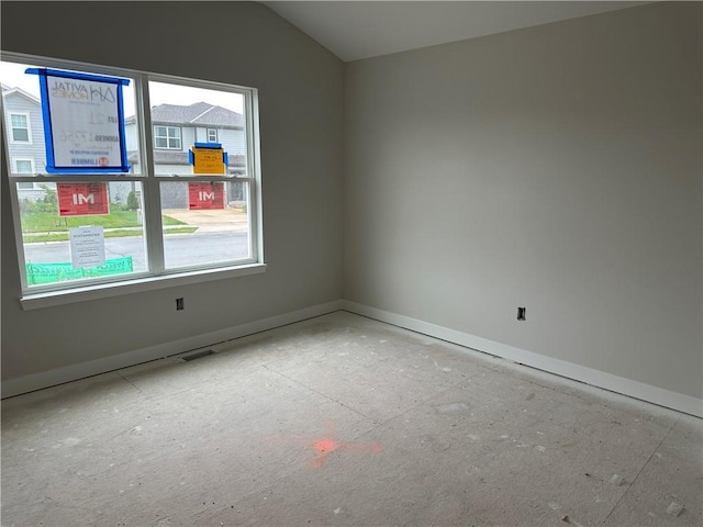 17756 Houston St, Gardner, KS 66030 - unfurnished room featuring baseboards and lofted ceiling