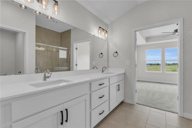 bathroom featuring an enclosed shower, vaulted ceiling, vanity, ceiling fan, and tile patterned flooring