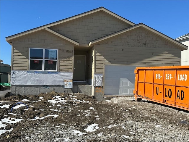 view of front of home with a garage