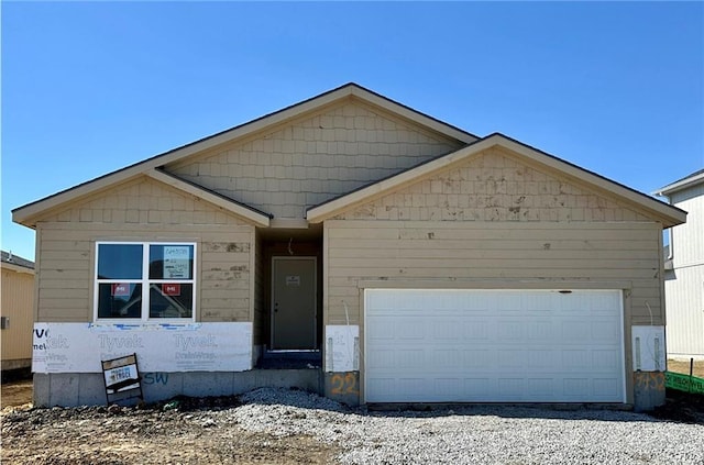 view of front of property featuring a garage