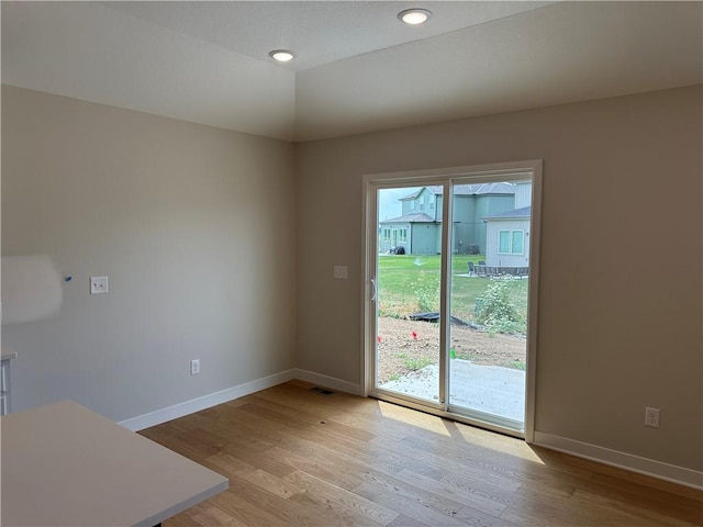 17752 Houston St, Gardner, KS 66030 - unfurnished dining area with baseboards and light wood-style floors