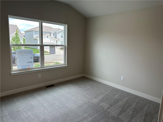 17752 Houston St, Gardner, KS 66030 - carpeted spare room featuring baseboards and lofted ceiling