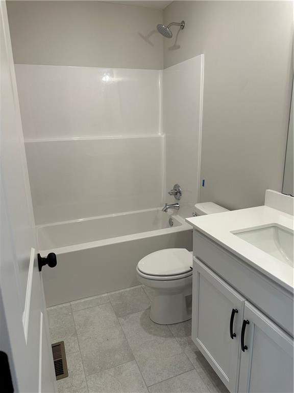 17752 Houston St, Gardner, KS 66030 - full bath with vanity and bathtub / shower combination