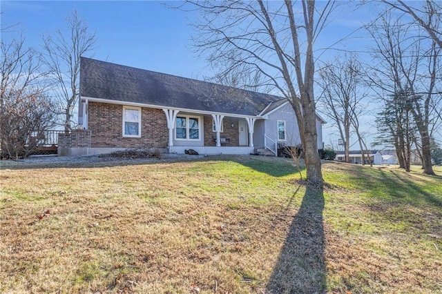 ranch-style house featuring a front yard