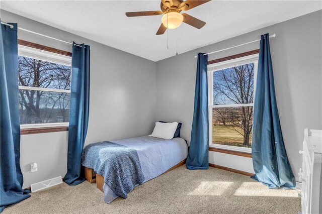 bedroom with carpet flooring and ceiling fan