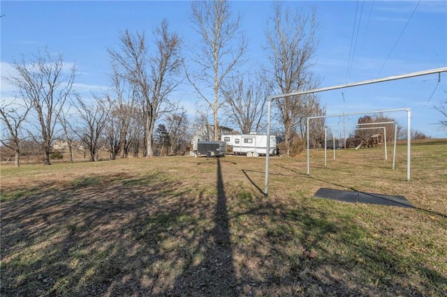 view of yard with a rural view