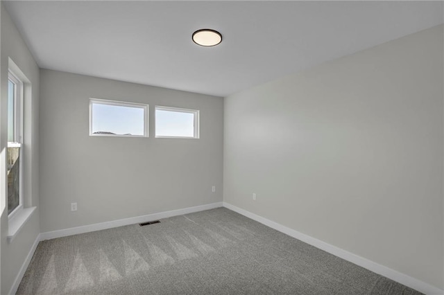 view of carpeted spare room