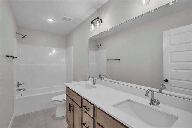 full bathroom featuring vanity, toilet, bathing tub / shower combination, and tile patterned flooring