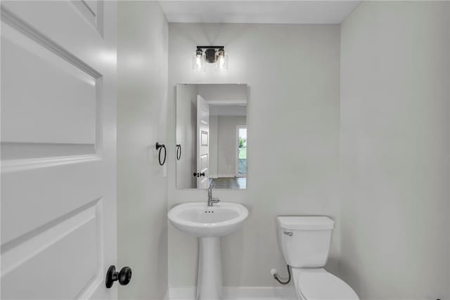 bathroom featuring toilet