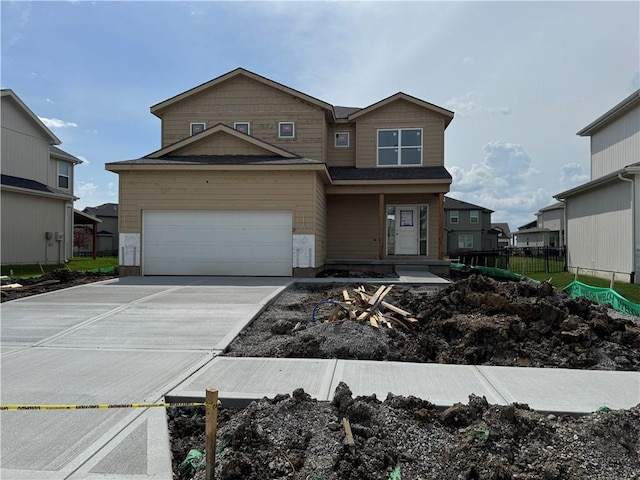 17744 Houston St, Gardner, KS 66030 - view of front of home featuring driveway and fence