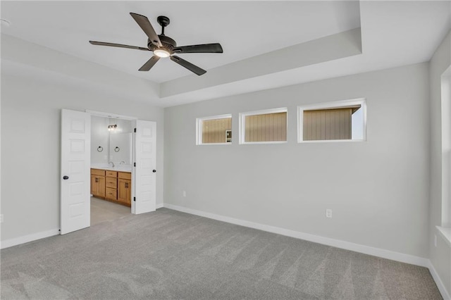 17744 Houston St, Gardner, KS 66030 - unfurnished bedroom with light colored carpet, baseboards, and ensuite bathroom