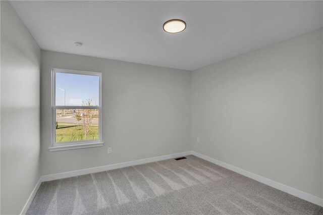 17744 Houston St, Gardner, KS 66030 - unfurnished room featuring carpet flooring and baseboards