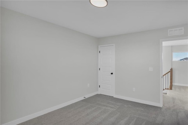17744 Houston St, Gardner, KS 66030 - carpeted empty room with baseboards