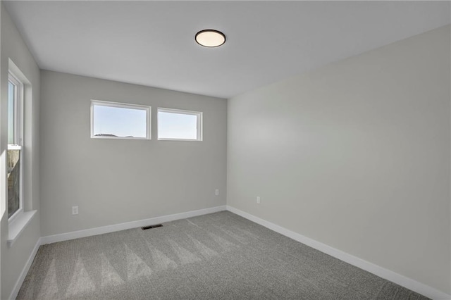 17744 Houston St, Gardner, KS 66030 - carpeted empty room with baseboards