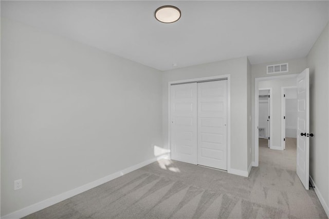 17744 Houston St, Gardner, KS 66030 - unfurnished bedroom with a closet, carpet, and baseboards