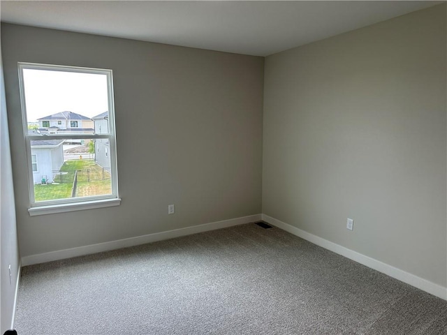 17744 Houston St, Gardner, KS 66030 - carpeted spare room featuring baseboards