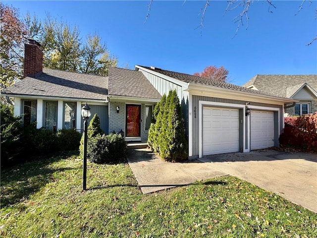 single story home with a garage and a front lawn