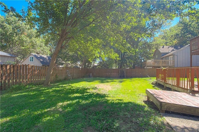 view of yard featuring a wooden deck