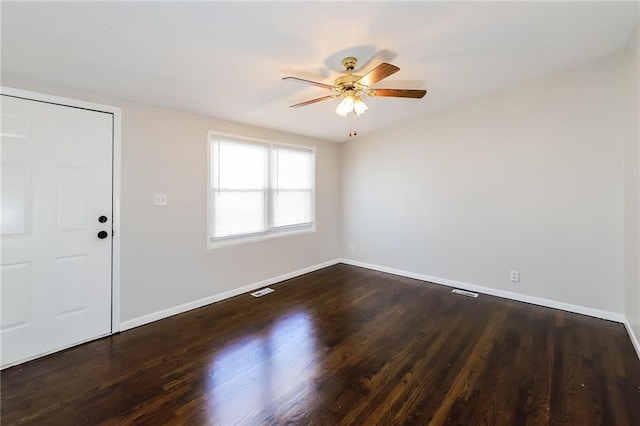 foyer entrance featuring dark hardwood / wood-style flooring and ceiling fan