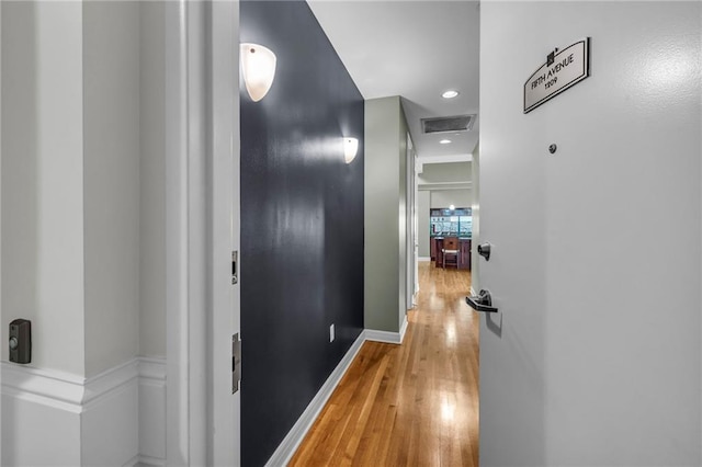 hallway featuring hardwood / wood-style floors