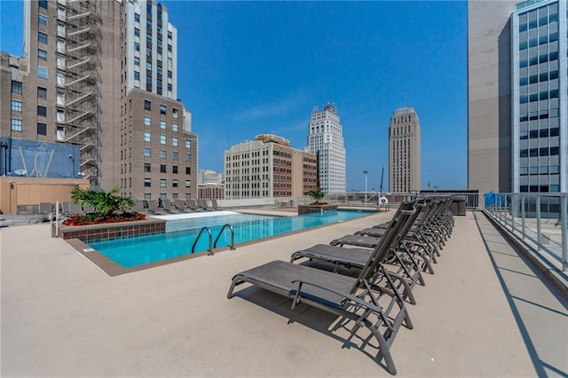 view of pool featuring a patio