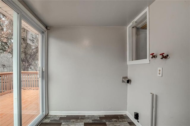 washroom with dark wood-type flooring