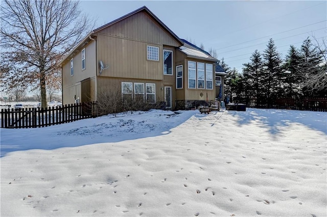 view of snow covered house