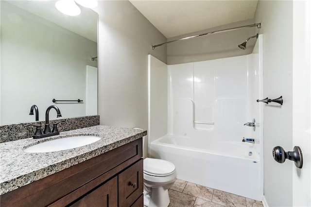 full bathroom with tile patterned flooring, vanity, tub / shower combination, and toilet