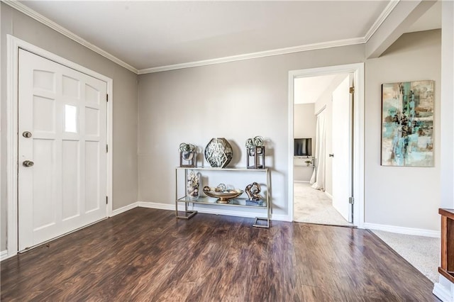 entryway featuring dark hardwood / wood-style flooring and crown molding