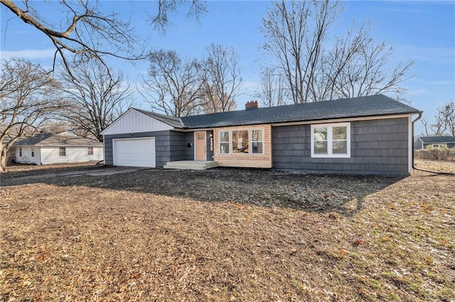 ranch-style house featuring a garage