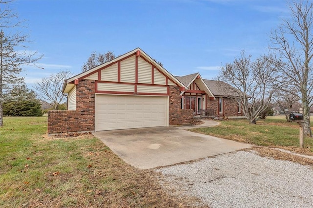 view of front of house featuring a garage and a front lawn