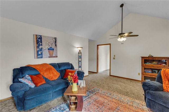 living room with carpet flooring, high vaulted ceiling, and ceiling fan